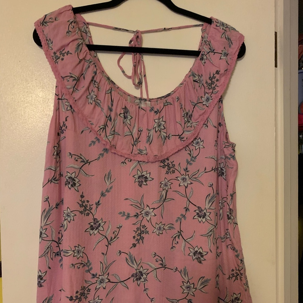 Light weight summer blouse with back tie detail.